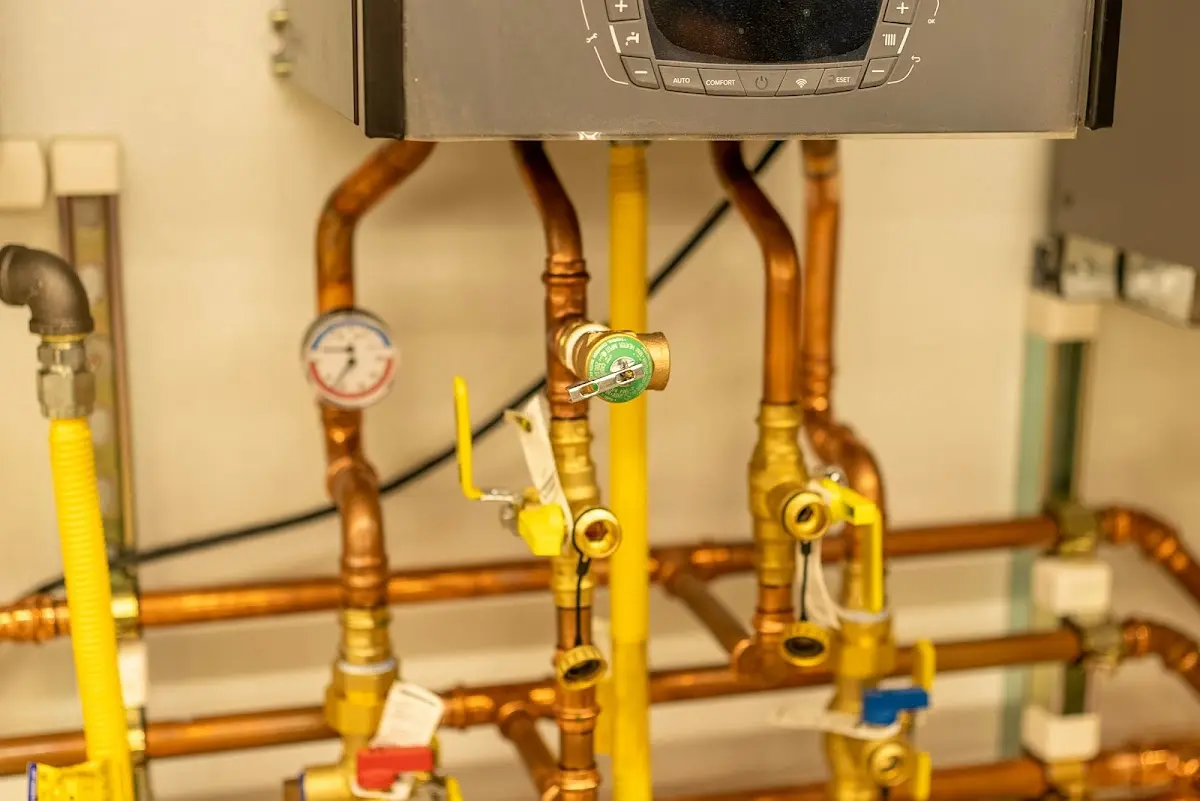 Licensed technician providing Water Heater Installation for a homeowner in Brownfields